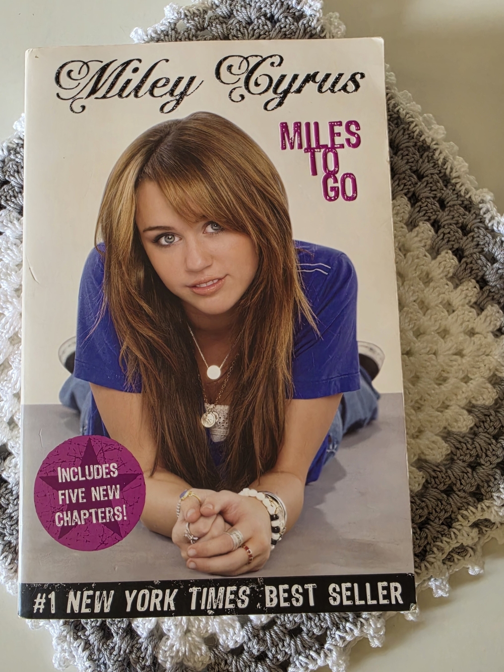 Miley Cyrus Miles to Go - White & Purple Cover Book